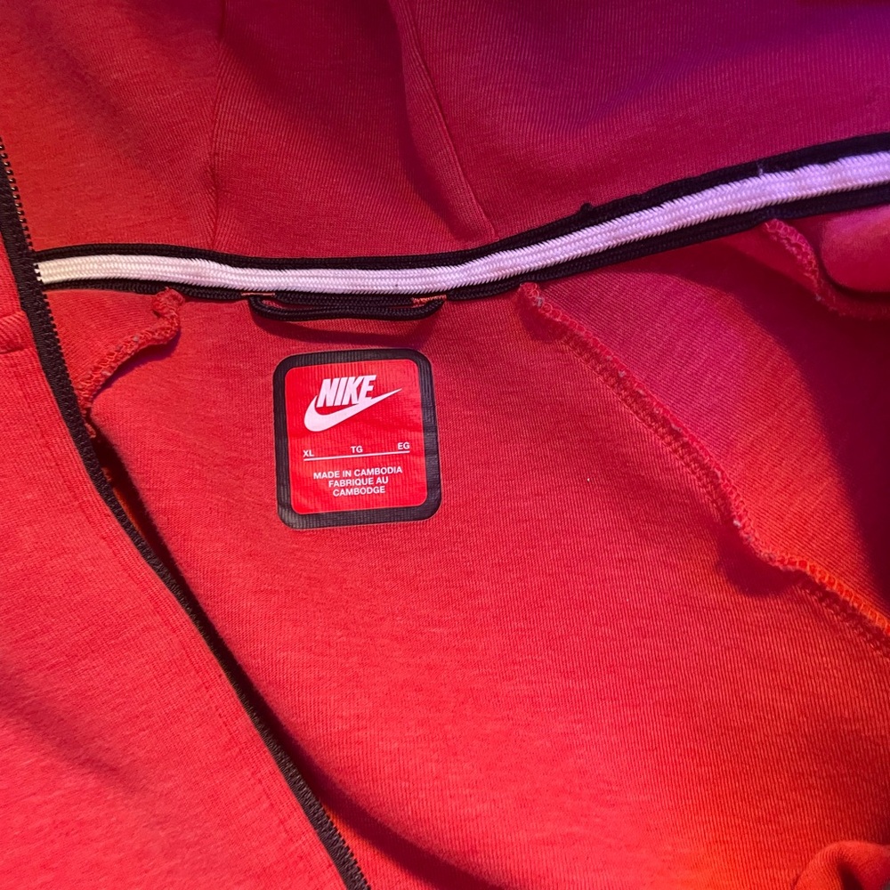 Red Nike tech jacket 60$